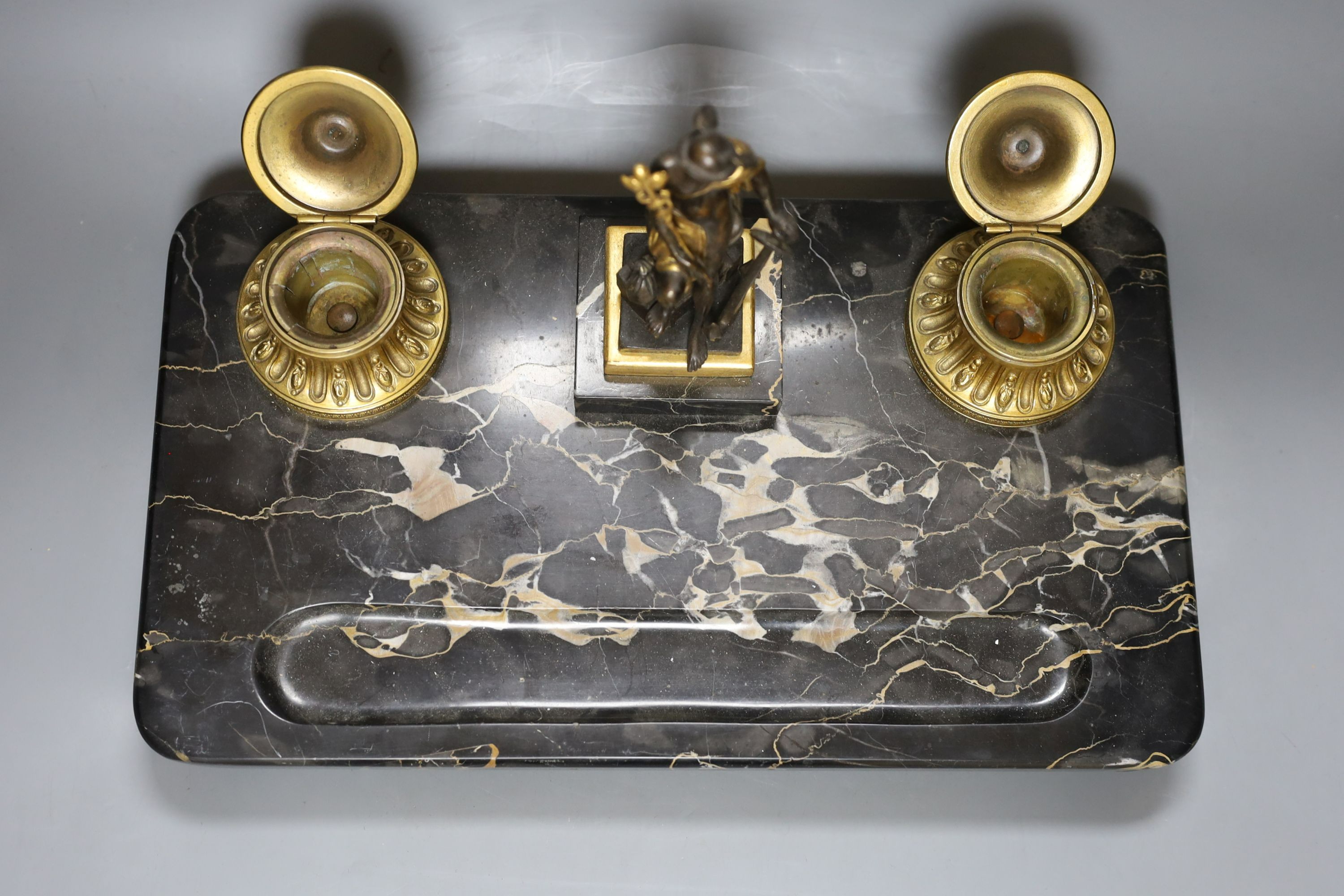 A bronze and marble ‘mercury’ inkstand, 40cm wide